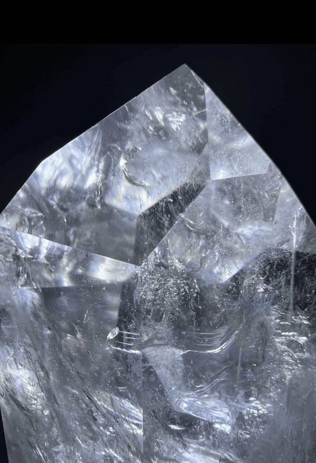 Clear quartz crystal representing crystal meanings, intuition, grounding, and spiritual connection