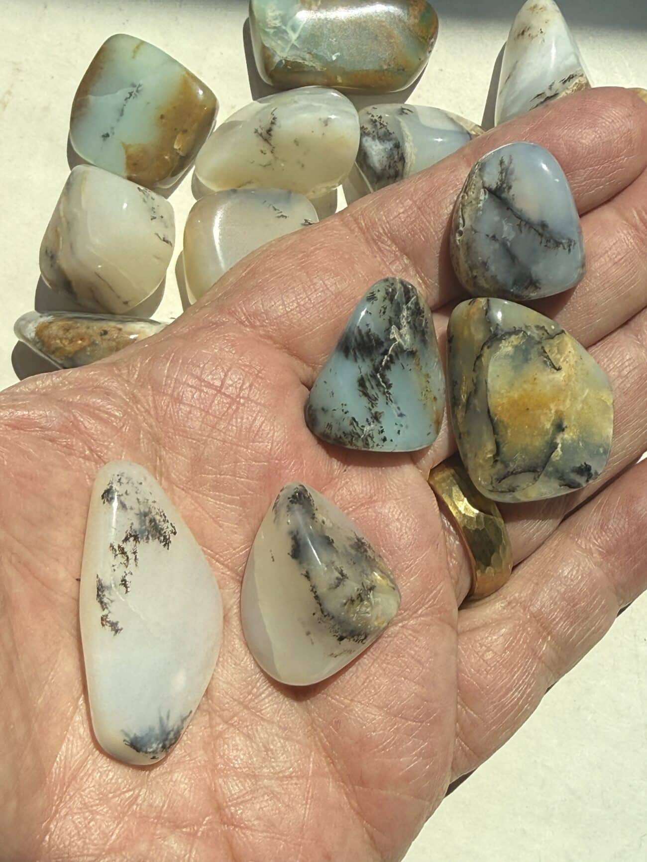 Peruvian Dendritic Opal Tumbled with natural dendritic patterns